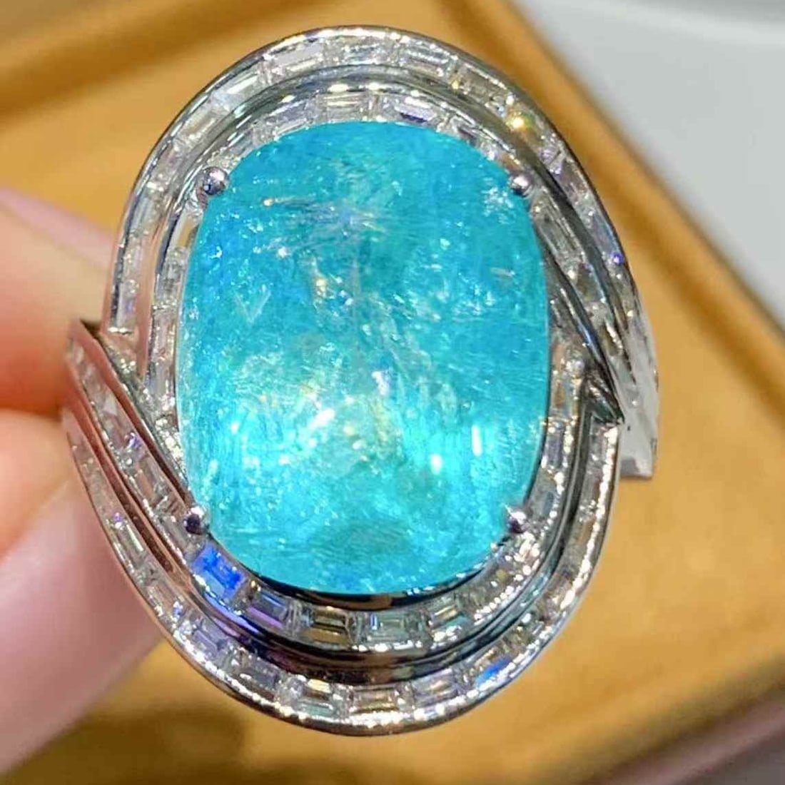 14k Gold 10.73 Ct Natural Paraiba Tourmaline & Diamond Ring: Ref:231067091 // gold content:14k gold // ring size:7. 25 us // // main gemstone:paraiba tourmaline // shape:oval // carat weight:10. 73ct // color:blue // treatment:natural // // adjacent gemstone 2