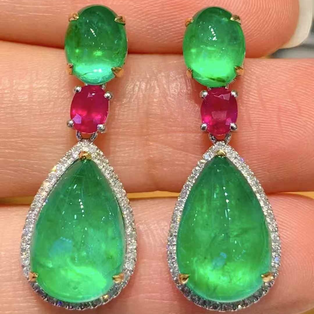 14k Gold 12.0 Ctw Natural Emerald & Ruby Earrings: Ref:231067109 // gold content:14k gold // main gemstone:emerald // shape:multiple // carat weight:11. 3ct // color:green // treatment:natural // // adjacent gemstone 2 : ruby // shape:oval // carat