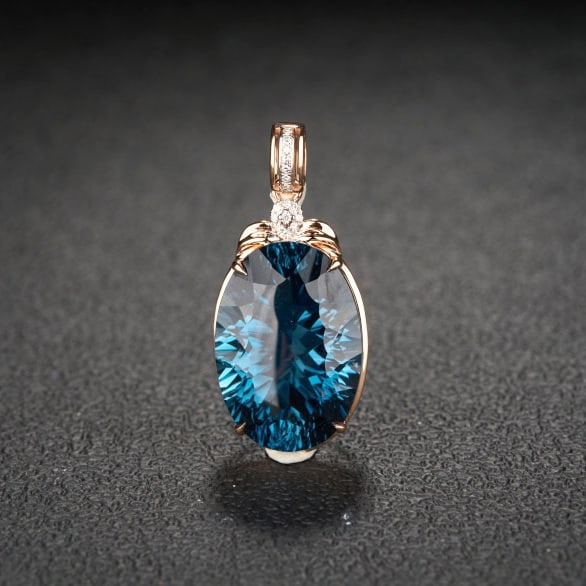 14k Gold 21.68 Ct Natural Topaz & Diamond Pendant( Without Chain ): Ref:231067122 // gold content:14k gold // main gemstone:topaz // shape:oval // carat weight:21. 68ct // color:blue // treatment:natural // // adjacent gemstone 2 : diamond // shape:round // clarity