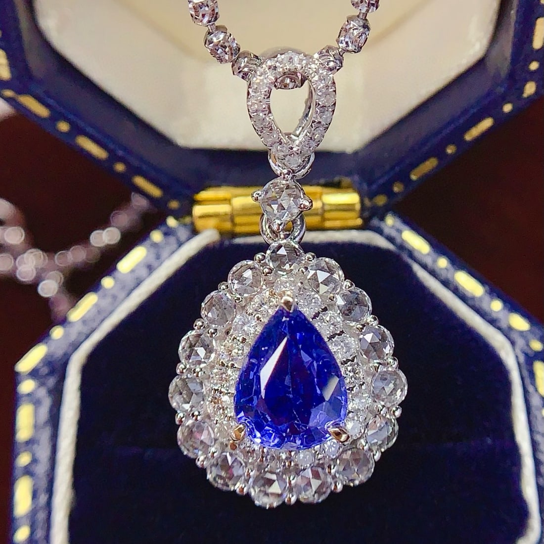 14k Gold 1.4 Ct Natural Sapphire & Diamond & Sapphire Pendant( Without Chain ): Ref:231067143 // gold content:14k gold // main gemstone:sapphire // shape:pear // carat weight:1. 4ct // color:blue // treatment:natural // // adjacent gemstone 2 : diamond // number of stones:31 //