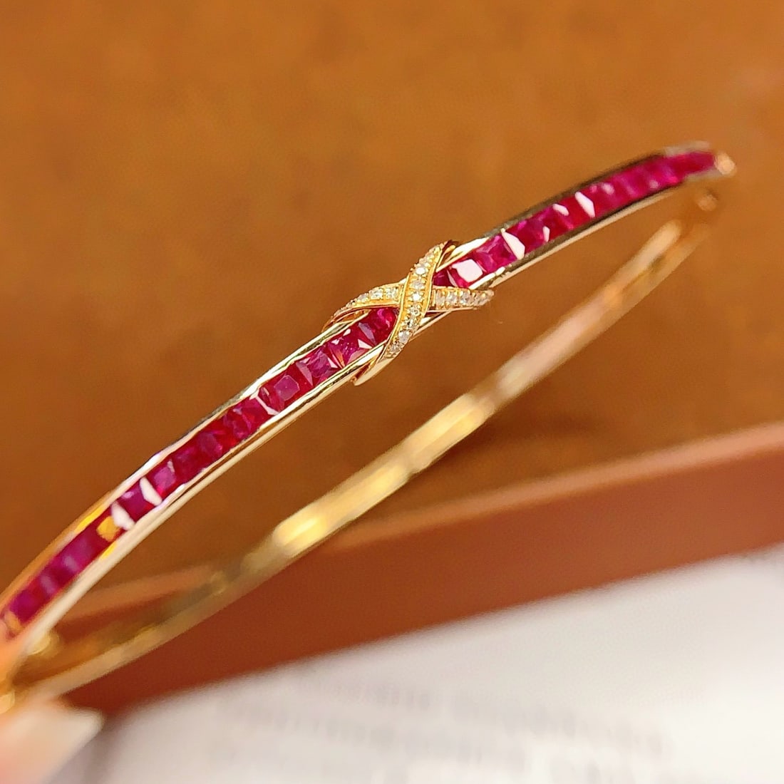14k Gold 3.6 Ct Natural Ruby & Diamond Bangle: Ref:231067225 // gold content:14k gold // main gemstone:ruby // shape:princess // carat weight:3. 6ct // color:red // treatment:natural // // adjacent gemstone 2 : diamond // number of stones:20 //