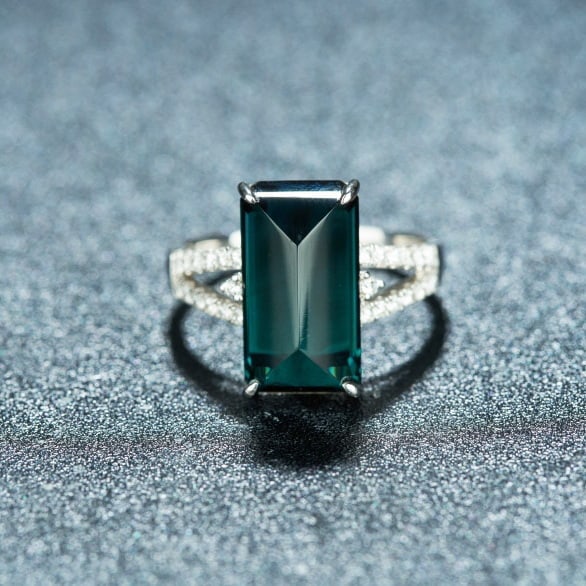 14k Gold 7.38 Ctw Natural Tourmaline & Diamond Ring: Ref:231068008 // gold content:14k gold // ring size:7. 25us // // main gemstone:tourmaline // shape:other // carat weight:7. 1ct // color:bluish green // treatment:natural // // adjacent gemstone 2 :