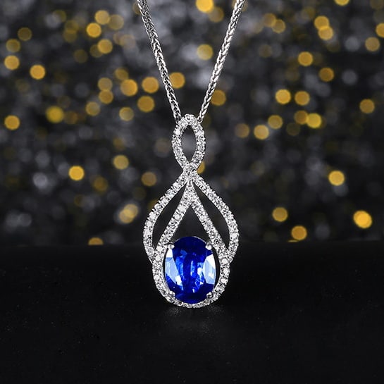 14k Gold 1.22 Ctw Natural Sapphire & Diamond Pendant( Without Chain ): Ref:231068051 // gold content:14k gold // main gemstone:sapphire // shape:oval // carat weight:1. 03ct // color:blue // treatment:natural // // adjacent gemstone 2 : diamond // number of stones:63 //