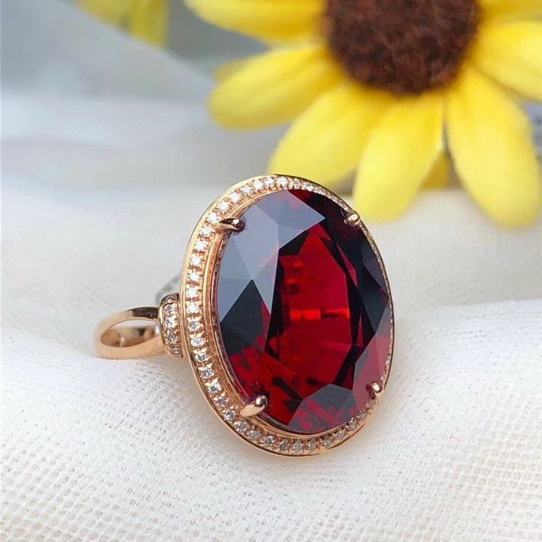 14k Gold 14.30 Ct Natural Garnet & Diamond Ring: Ref:231068060 // gold content:14k gold // ring size:7. 25us // // main gemstone:garnet // shape:oval // carat weight:14. 30ct // color:red // treatment:natural // // adjacent gemstone 2 : diamond //