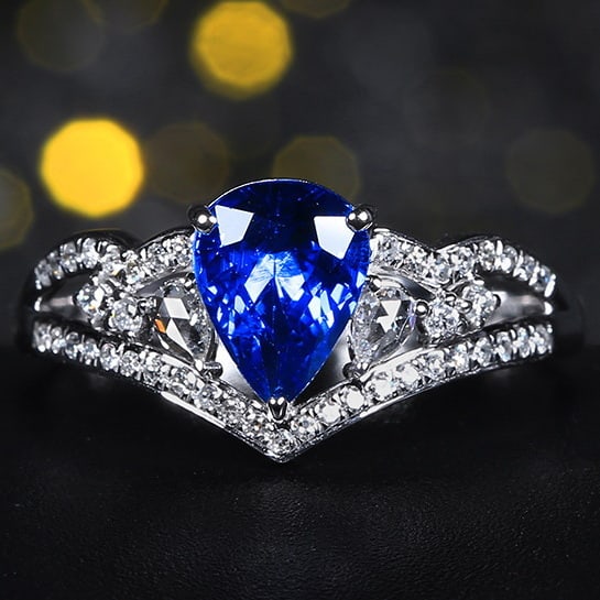 14k Gold 1.56 Ctw Natural Sapphire & Diamond Ring: Ref:231068061 // gold content:14k gold // ring size:7. 25us // // main gemstone:sapphire // shape:pear // carat weight:1. 33ct // color:cornflower blue // treatment:natural // // adjacent gemstone 2