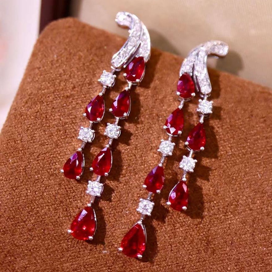 14k Gold 3.99 Ctw Natural Ruby & Diamond Earrings: Ref:231068105 // gold content:14k gold // main gemstone:ruby // shape:pear // carat weight:3. 42ct // color:red // treatment:natural // // adjacent gemstone 2 : diamond // shape:round // carat weight: