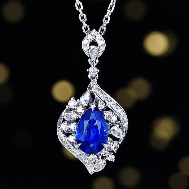 14k Gold 2.11 Ctw Natural Sapphire & Diamond Pendant( Without Chain ): Ref:231068299 // gold content:14k gold // main gemstone:sapphire // shape:pear // carat weight:1. 77ct // color:blue // treatment:natural // // adjacent gemstone 2 : diamond // number of stones:47 // 