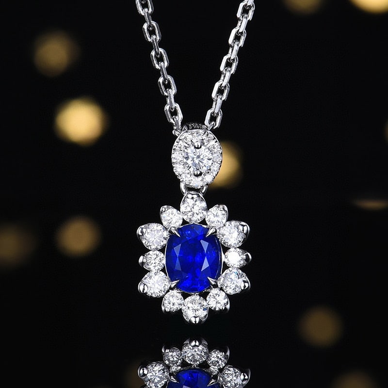 14k Gold 1.04 Ctw Natural Sapphire & Diamond Pendant( Without Chain ): Ref:231068309 // gold content:14k gold // main gemstone:sapphire // shape:oval // carat weight:0. 59ct // color:royal blue // treatment:natural // // adjacent gemstone 2 : diamond // number of