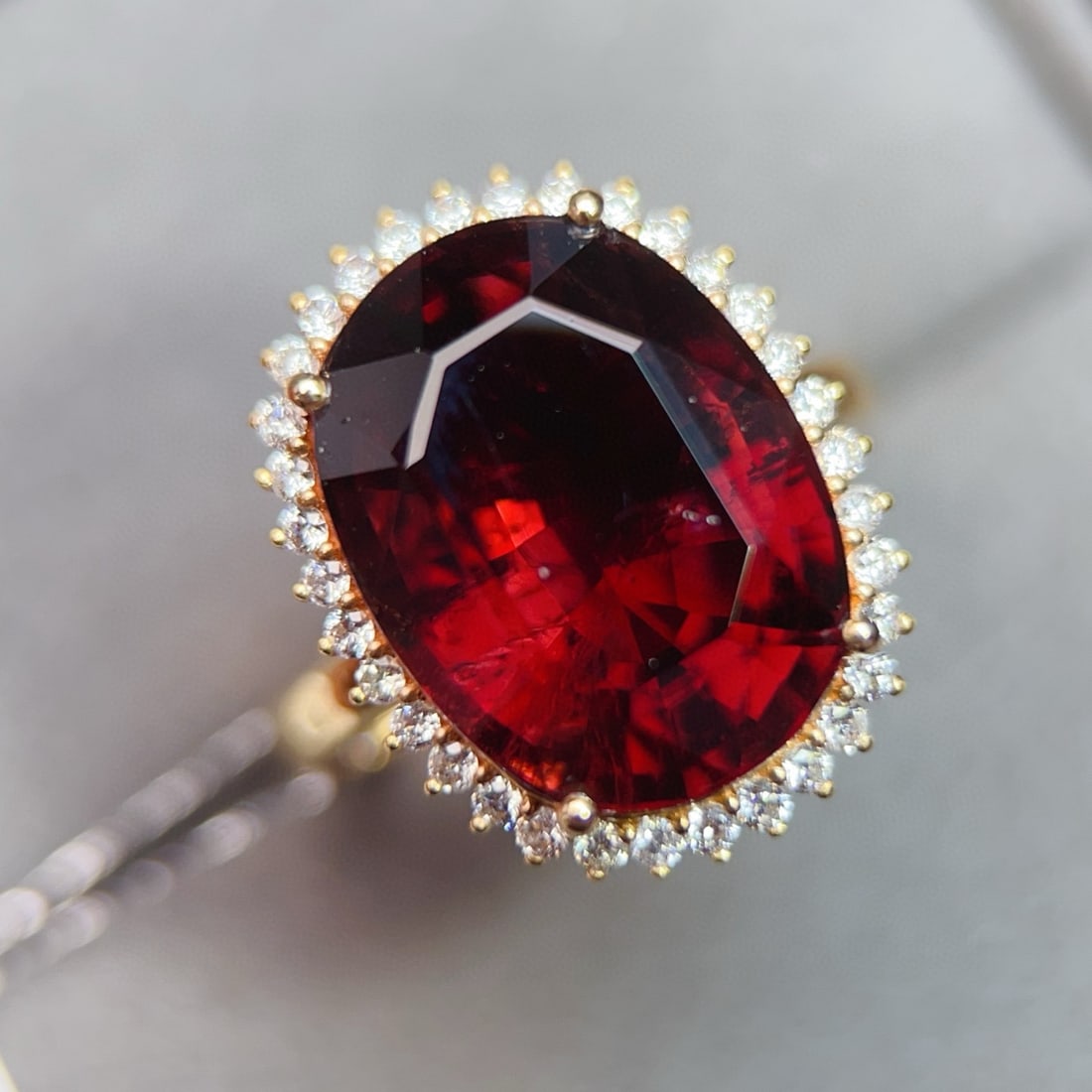 14k Gold 9.89 Ctw Natural Tourmaline & Diamond Ring: Ref:231068321 // gold content:14k gold // ring size:7. 25us // // main gemstone:tourmaline // shape:oval // carat weight:9. 55ct // color:red // treatment:natural // // adjacent gemstone 2 : diamond