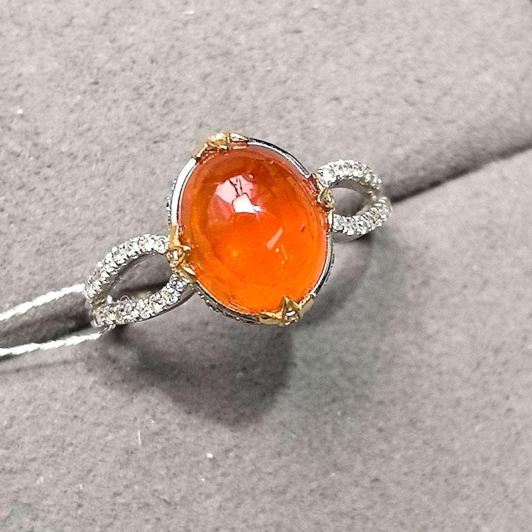 14k Gold 4.66 Ctw Natural Spessartine & Diamond Ring: Ref:231068325 // gold content:14k gold // ring size:7. 25us // // main gemstone:spessartine // shape:oval // carat weight:4. 36ct // color:orange // treatment:natural // // adjacent gemstone 2 : diamo