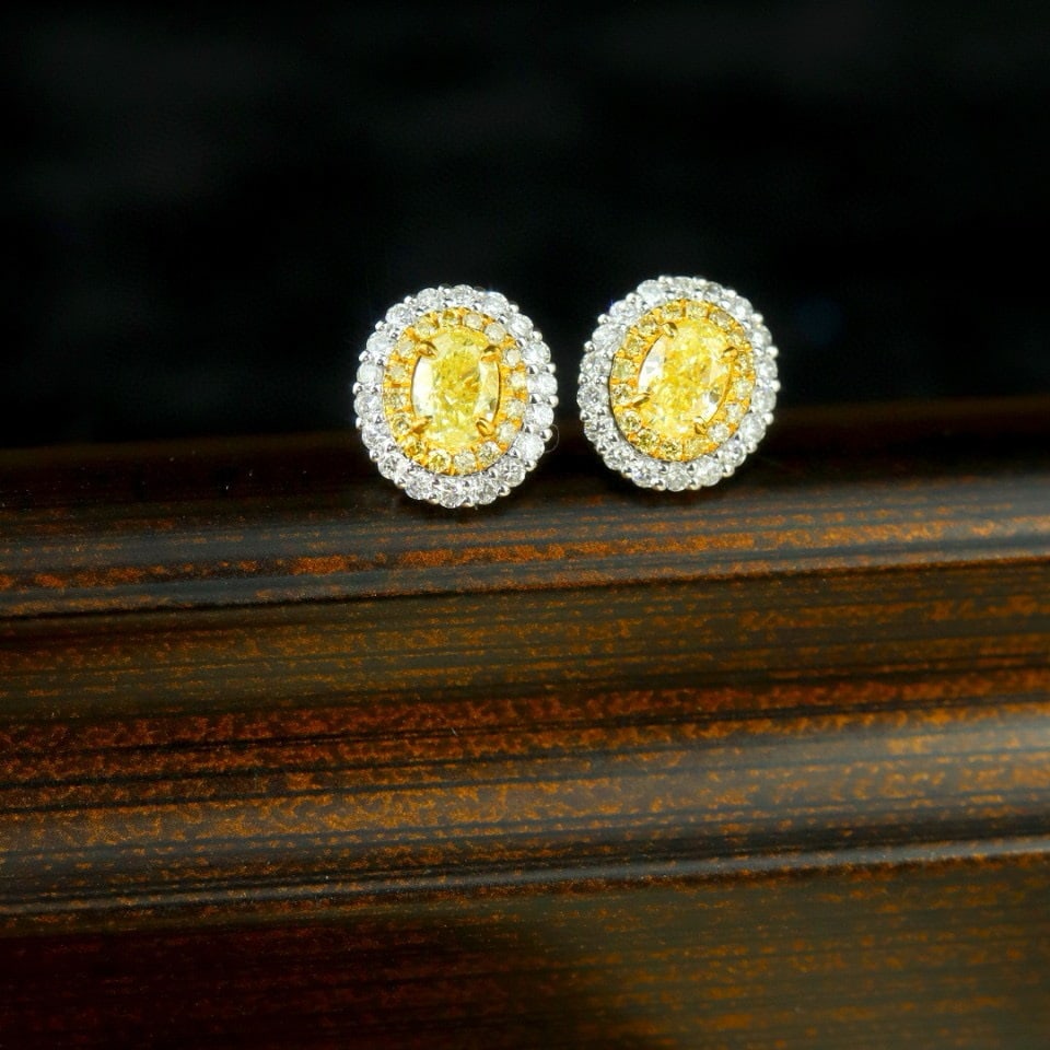 14k Gold 0.71 Ctw Natural Yellow Diamond & Diamond Earrings: Ref:231068348 // gold content:14k gold // main gemstone:yellow diamond // shape:oval // carat weight:0. 45ct // color:yellow // treatment:natural // // adjacent gemstone 2 : diamond // shape:round //