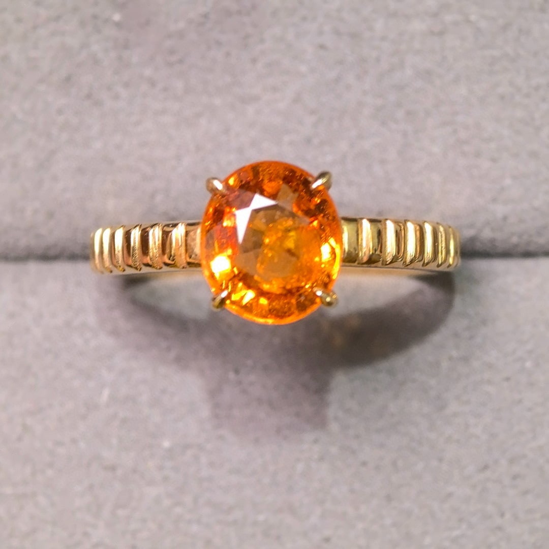 14k Gold 2.01 Ct Natural Spessartine Ring: Ref:231068354 // gold content:14k gold // ring size:7. 25us // // main gemstone:spessartine // shape:oval // carat weight:2. 01ct // color:orange // treatment:natural // Condition: New Low Estimate: 5