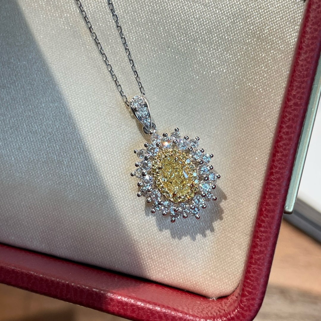 14k Gold 1.13 Ctw Natural Yellow Diamond & Diamond Pendant( Without Chain ): Ref:231068371 // gold content:14k gold // main gemstone:yellow diamond // shape:oval // carat weight:0. 50ct // color:yellow // treatment:natural // // adjacent gemstone 2 : diamond // shape:round //