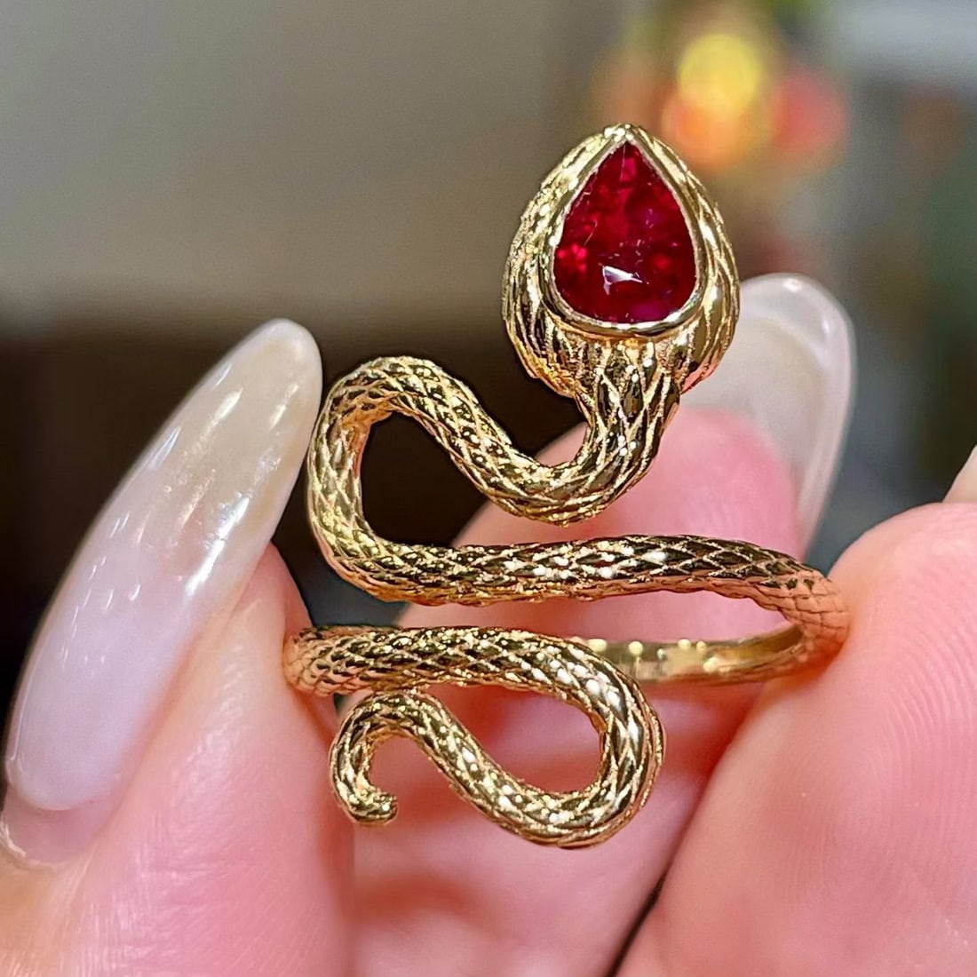 14k Gold 0.7 Ct Vivid Red Natural Ruby Ring: Ref:231068396 // gold content:14k gold // ring size:7. 25us // // main gemstone:ruby // shape:pear // carat weight:0. 7ct // color:vivid red // treatment:natural // Condition: New Low Estimate: