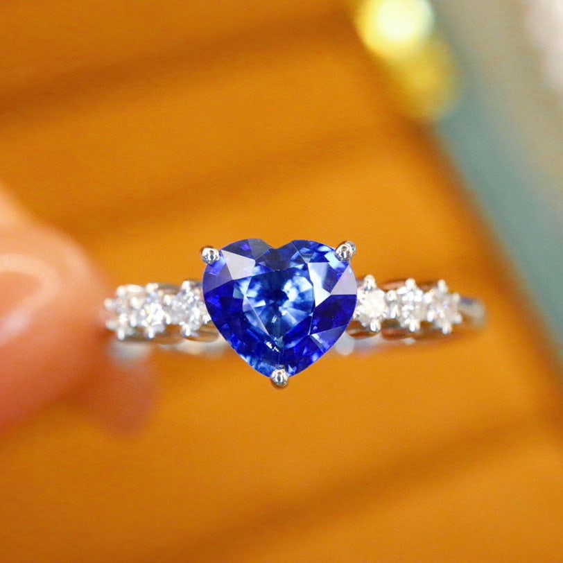 14k Gold 0.98 Ctw Natural Sapphire & Diamond Ring: Ref:231068419 // gold content:14k gold // ring size:7. 25us // // main gemstone:sapphire // shape:heart // carat weight:0. 86ct // color:royal blue // treatment:natural // // adjacent gemstone 2 :