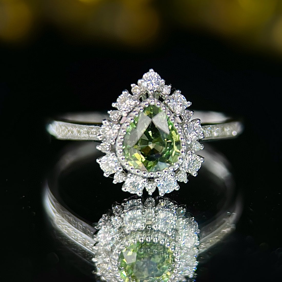 14k Gold 0.95 Ctw Natural Sapphire & Diamond Ring: Ref:231068433 // gold content:14k gold // ring size:7. 25us // // main gemstone:sapphire // shape:pear // carat weight:0. 7ct // color:green // treatment:natural // // adjacent gemstone 2 : diamond