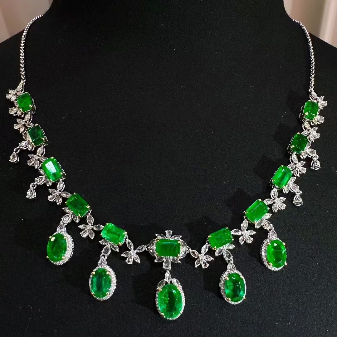 14k Gold 11.9 Ct Vivid Green Natural Emerald & Diamond & Sapphire Necklace: Ref:231069001 // gold content:14k gold // main gemstone:emerald // shape:multiple // carat weight:11. 9ct // color:vivid green // treatment:natural // // adjacent gemstone 2 : diamond // shape:round