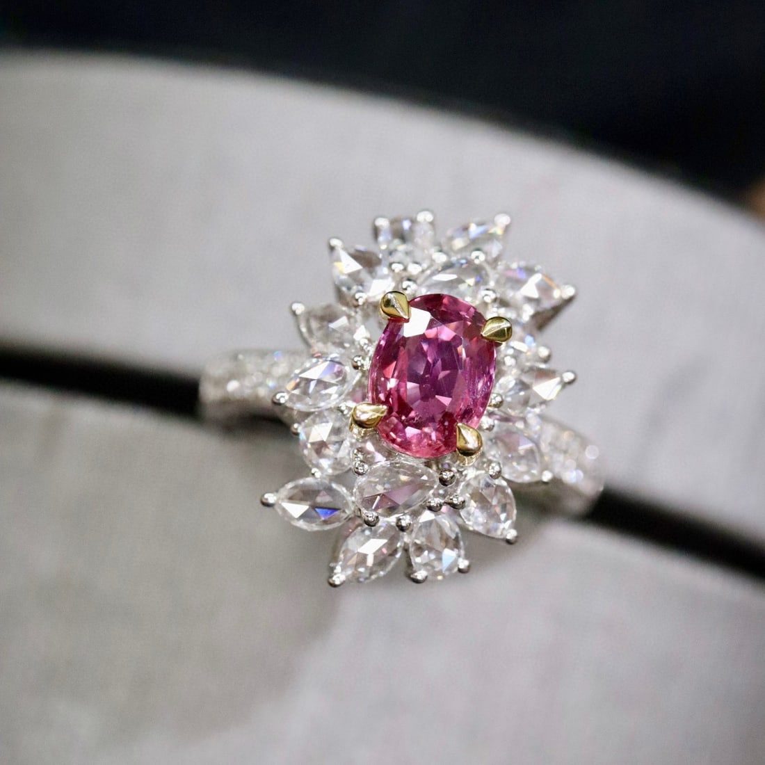 14k Gold 2.10 Ctw Natural Padparadscha Sapphire & Diamond Ring: Ref:231070081 // gold content:14k gold // ring size:7. 25us // // main gemstone:padparadscha sapphire // shape:oval // carat weight:1. 09ct // color:orangish pink // treatment:natural // // adjacent