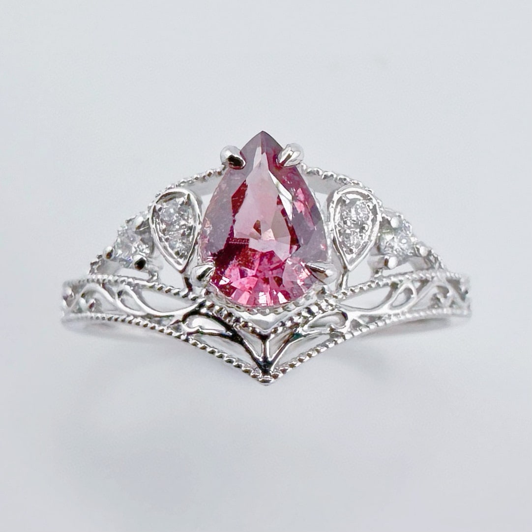 14k Gold 0.85 Ctw Natural Sapphire & Diamond Ring: Ref:231070092 // gold content:14k gold // ring size:7. 25us // // main gemstone:sapphire // shape:pear // carat weight:0. 77ct // color:pink // treatment:natural // // adjacent gemstone 2 : diamond