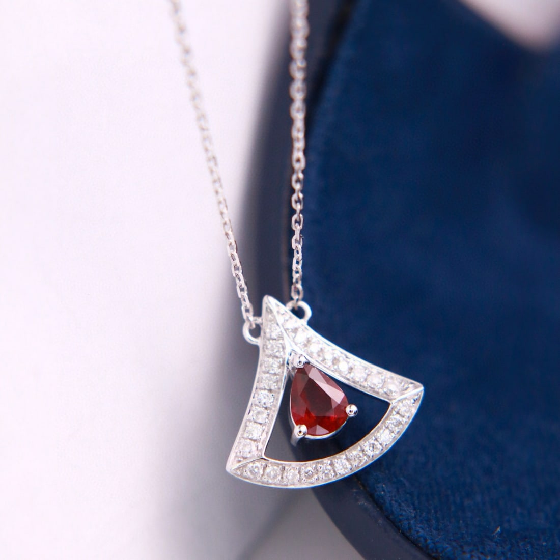 14k Gold 0.49 Ctw Vivid Red Natural Ruby & Diamond Necklace: Ref:231070116 // gold content:14k gold // main gemstone:ruby // shape:pear // carat weight:0. 35ct // color:vivid red // treatment:natural // // adjacent gemstone 2 : diamond // shape:round // carat