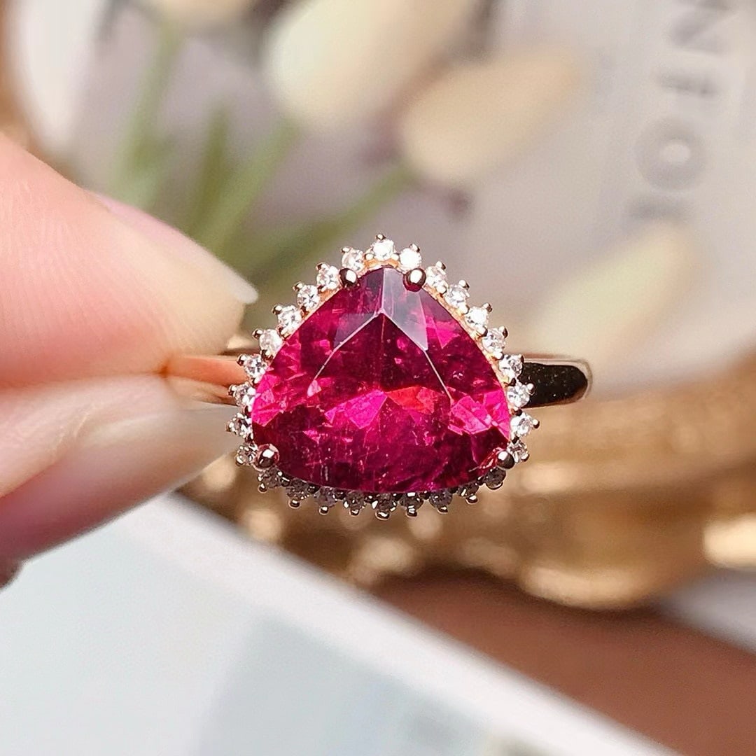 14k Gold 2.55 Ct Natural Tourmaline & Diamond Ring: Ref:231070119 // gold content:14k gold // ring size:7. 25us // // main gemstone:tourmaline // shape:pear // carat weight:2. 55ct // color:red // treatment:natural // // adjacent gemstone 2 : diamond