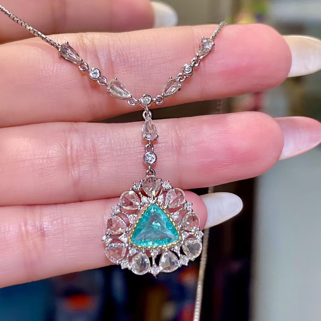 14k Gold 3.29 Ctw Natural Paraiba Tourmaline & Diamond Necklace: Ref:231070141 // gold content:14k gold // main gemstone:paraiba tourmaline // shape:triangle // carat weight:1. 18ct // color:blue // treatment:natural // // adjacent gemstone 2 : diamond //