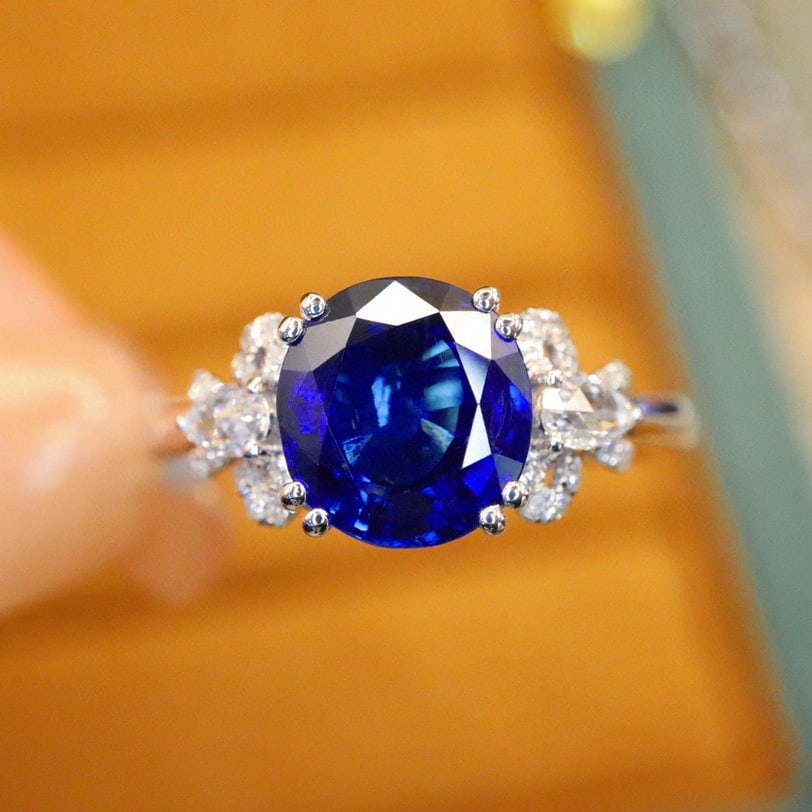 14k Gold 2.15 Ctw Natural Sapphire & Diamond Ring: Ref:231070155 // gold content:14k gold // ring size:7. 25us // // main gemstone:sapphire // shape:oval // carat weight:2. 00ct // color:royal blue // treatment:natural // // adjacent gemstone 2 : diam