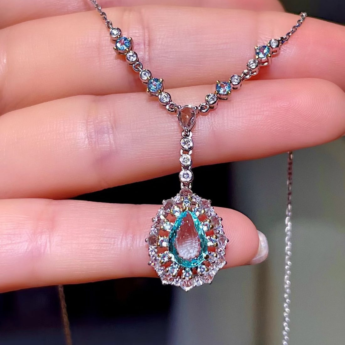 14k Gold 1.95 Ctw Natural Paraiba Tourmaline & Diamond Necklace: Ref:231070179 // gold content:14k gold // main gemstone:paraiba tourmaline // shape:pear // carat weight:1. 20ct // color:blue // treatment:natural // // adjacent gemstone 2 : diamond //