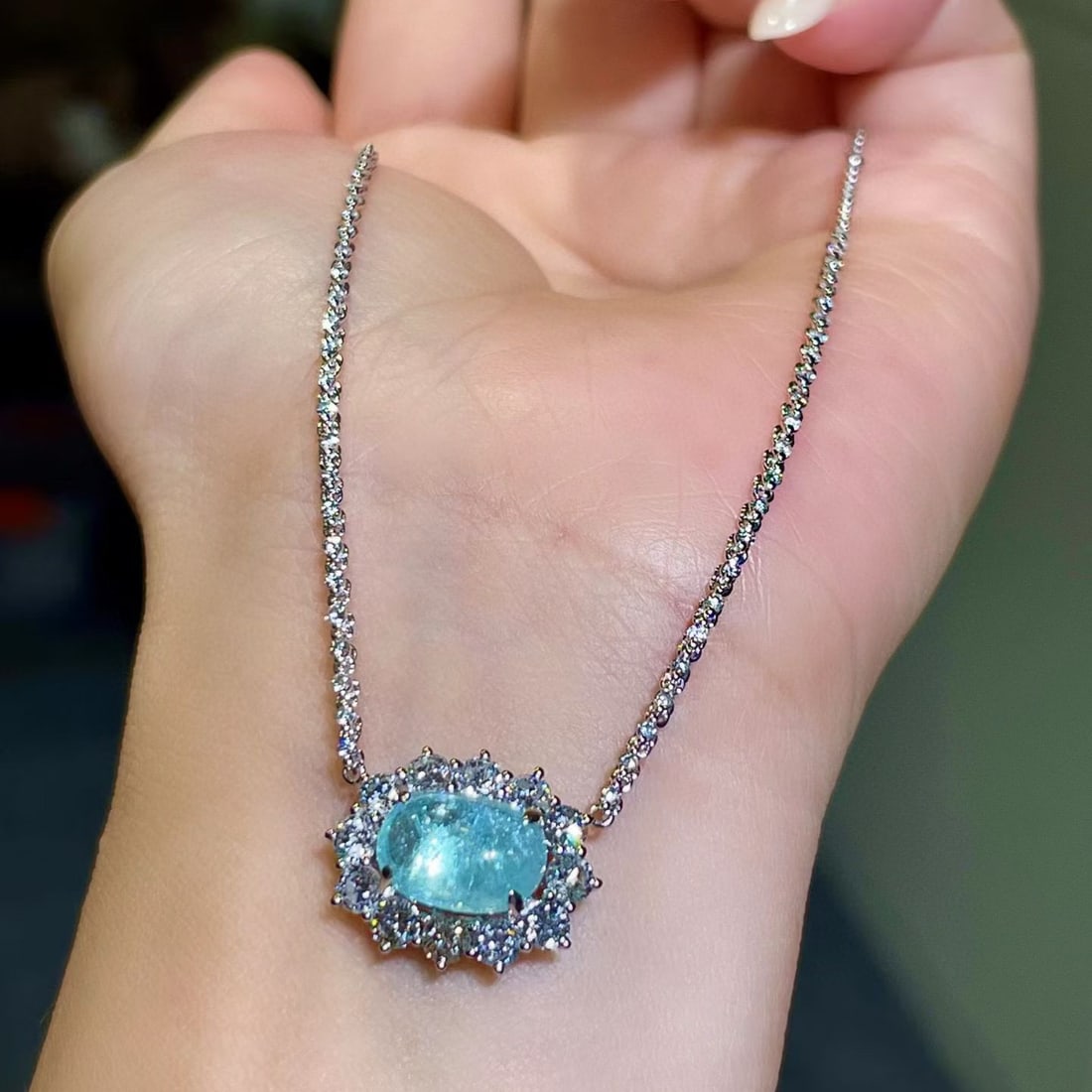 14k Gold 4.96 Ctw Natural Paraiba Tourmaline & Diamond Necklace: Ref:231070192 // gold content:14k gold // main gemstone:paraiba tourmaline // shape:oval // carat weight:3. 25ct // color:blue // treatment:natural // // adjacent gemstone 2 : diamond // shape:round