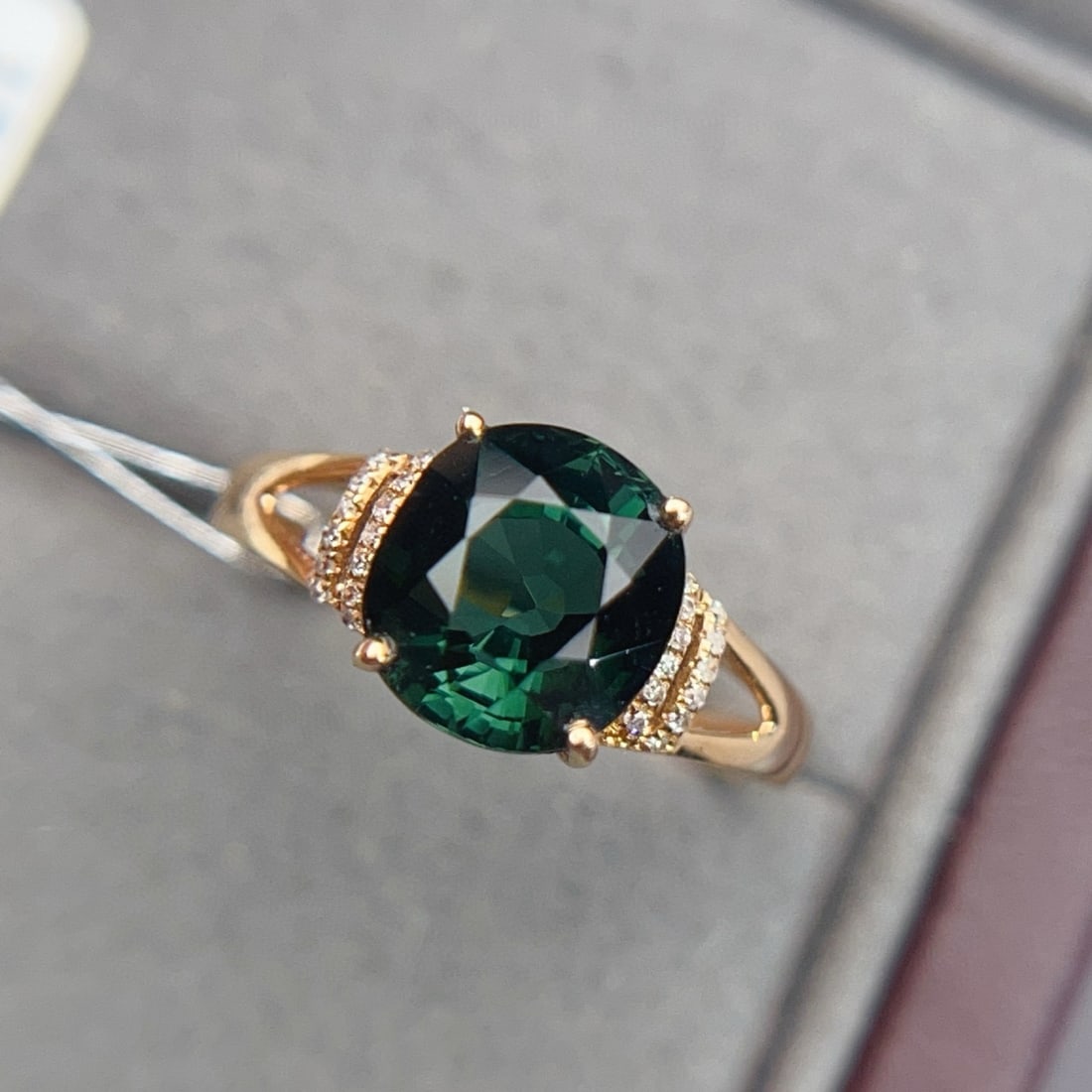 14k Gold 3.43 Ctw Natural Tourmaline & Diamond Ring: Ref:231070223 // gold content:14k gold // ring size:7. 25us // // main gemstone:tourmaline // shape:oval // carat weight:3. 35ct // color:green // treatment:natural // // adjacent gemstone 2 : diamond