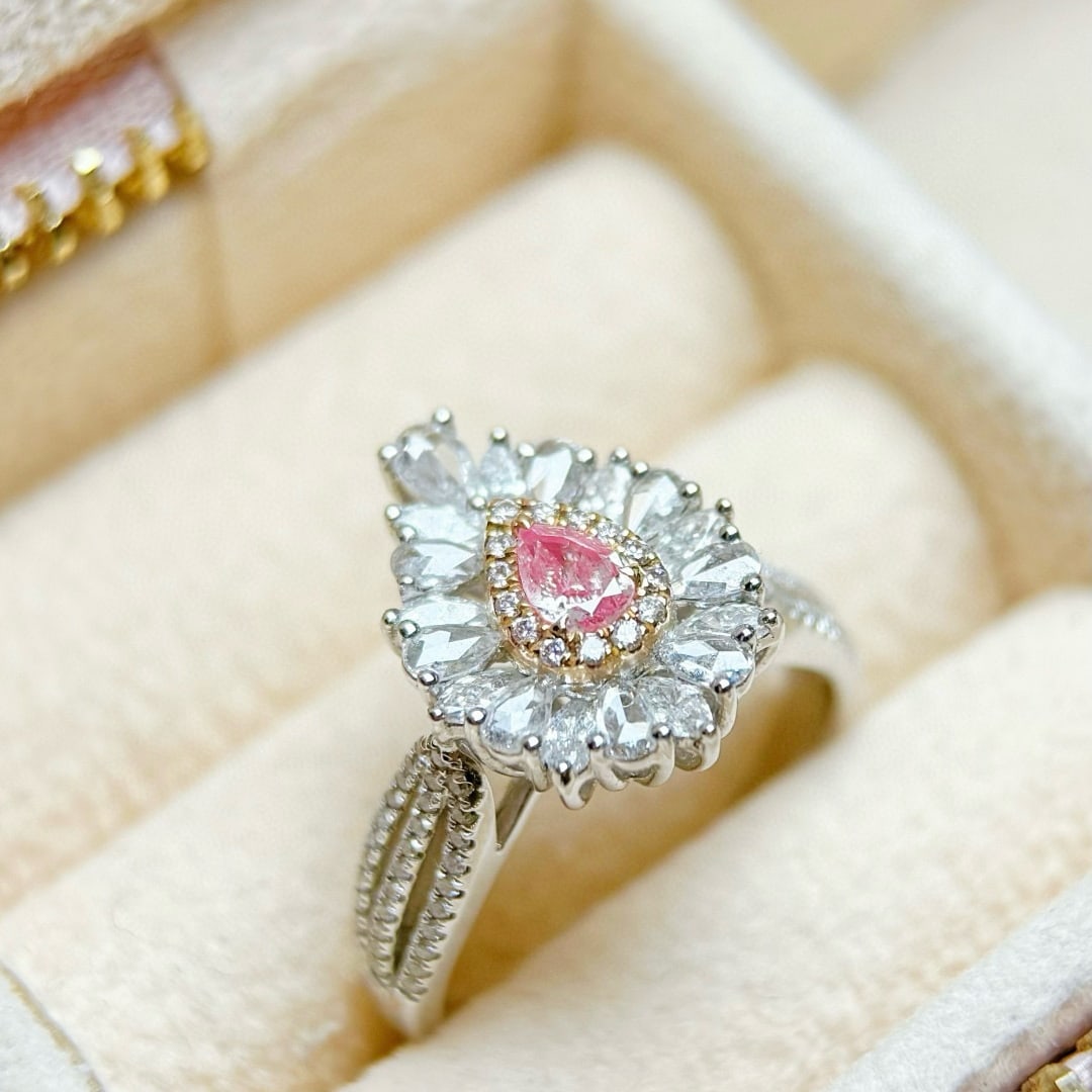 14k Gold 1.09 Ctw Natural Pink Diamond & Diamond Ring: Ref:231070231 // gold content:14k gold // ring size:7. 25us // // main gemstone:pink diamond // shape:pear // carat weight:0. 20ct // color:pink // treatment:natural // // adjacent gemstone 2 : diamon