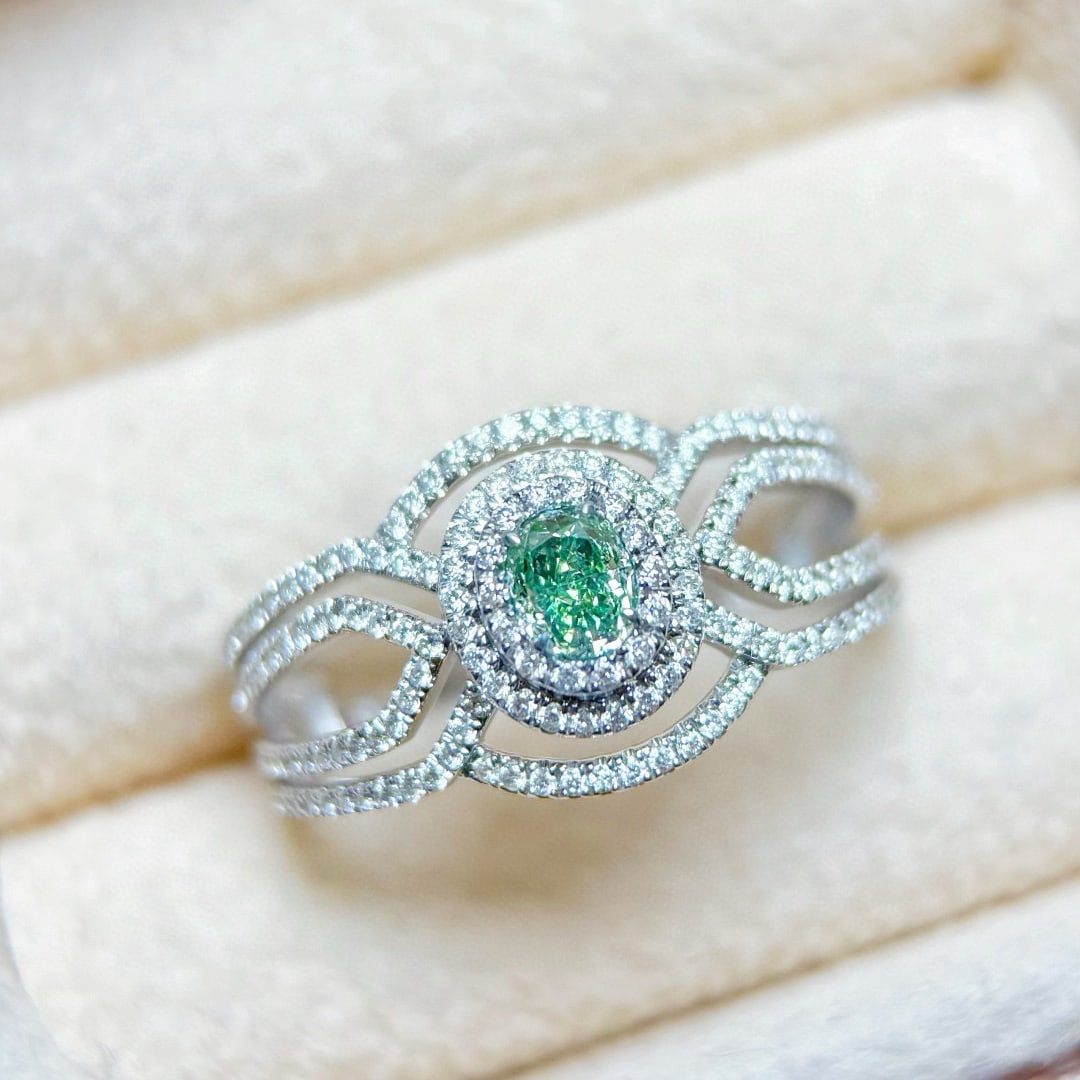 14k Gold 0.75 Ctw Natural Green Diamond & Diamond Ring: Ref:231070233 // gold content:14k gold // ring size:7. 25us // // main gemstone:green diamond // shape:oval // carat weight:0. 27ct // color:green // treatment:natural // // adjacent gemstone 2 :