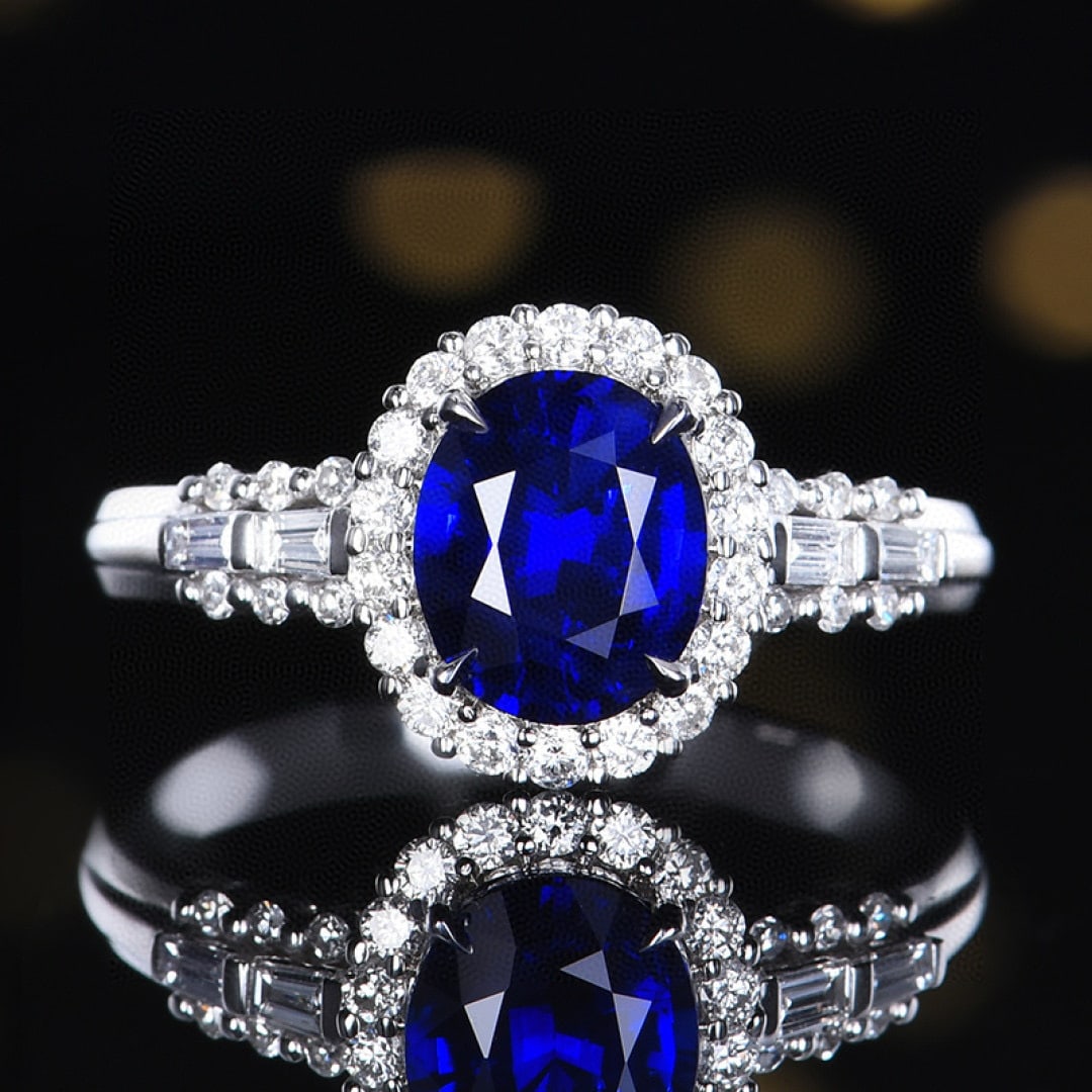 14k Gold 2.06 Ctw Vivid Blue Natural Sapphire & Diamond Ring: Ref:231070259 // gold content:14k gold // ring size:7. 25us // // main gemstone:sapphire // shape:oval // carat weight:1. 68ct // color:vivid blue // treatment:natural // // adjacent gemstone 2 :