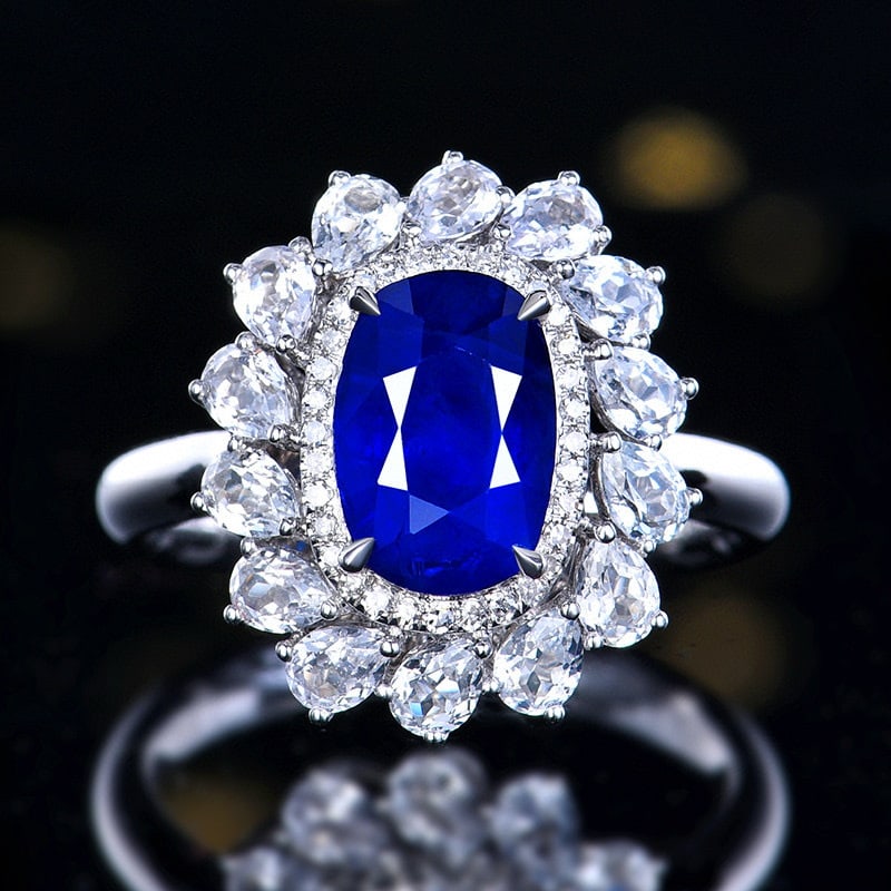 14k Gold 2.89 Ctw Natural Sapphire & Diamond Ring: Ref:231070285 // gold content:14k gold // ring size:7. 25us // // main gemstone:sapphire // shape:oval // carat weight:2. 8ct // color:royal blue // treatment:natural // // adjacent gemstone 2 :