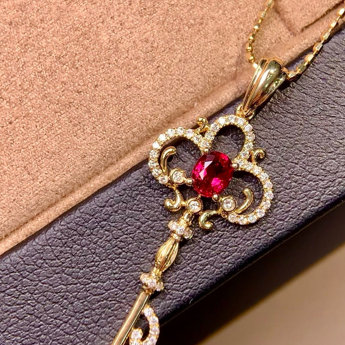 14k Gold 0.45 Ctw Natural Ruby & Diamond Pendant( Without Chain ): Ref:231070326 // gold content:14k gold // main gemstone:ruby // shape:oval // carat weight:0. 34ct // color:red // treatment:natural // // adjacent gemstone 2 : diamond // shape:round // carat