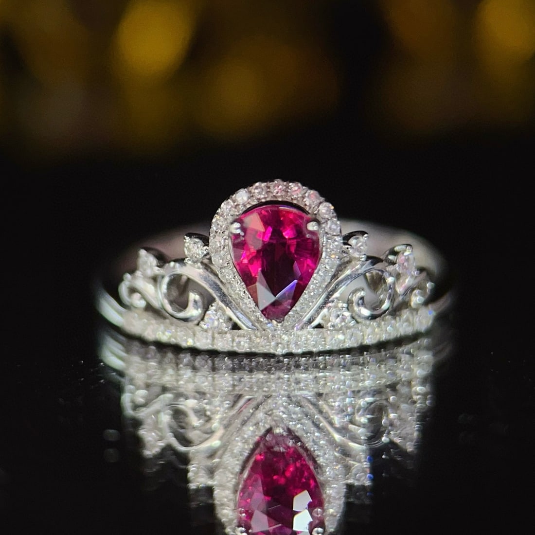 14k Gold 0.65 Ctw Natural Tourmaline & Diamond Ring: Ref:231070393 // gold content:14k gold // ring size:7. 25us // // main gemstone:tourmaline // shape:pear // carat weight:0. 45ct // color:red // treatment:natural // // adjacent gemstone 2 : diamond