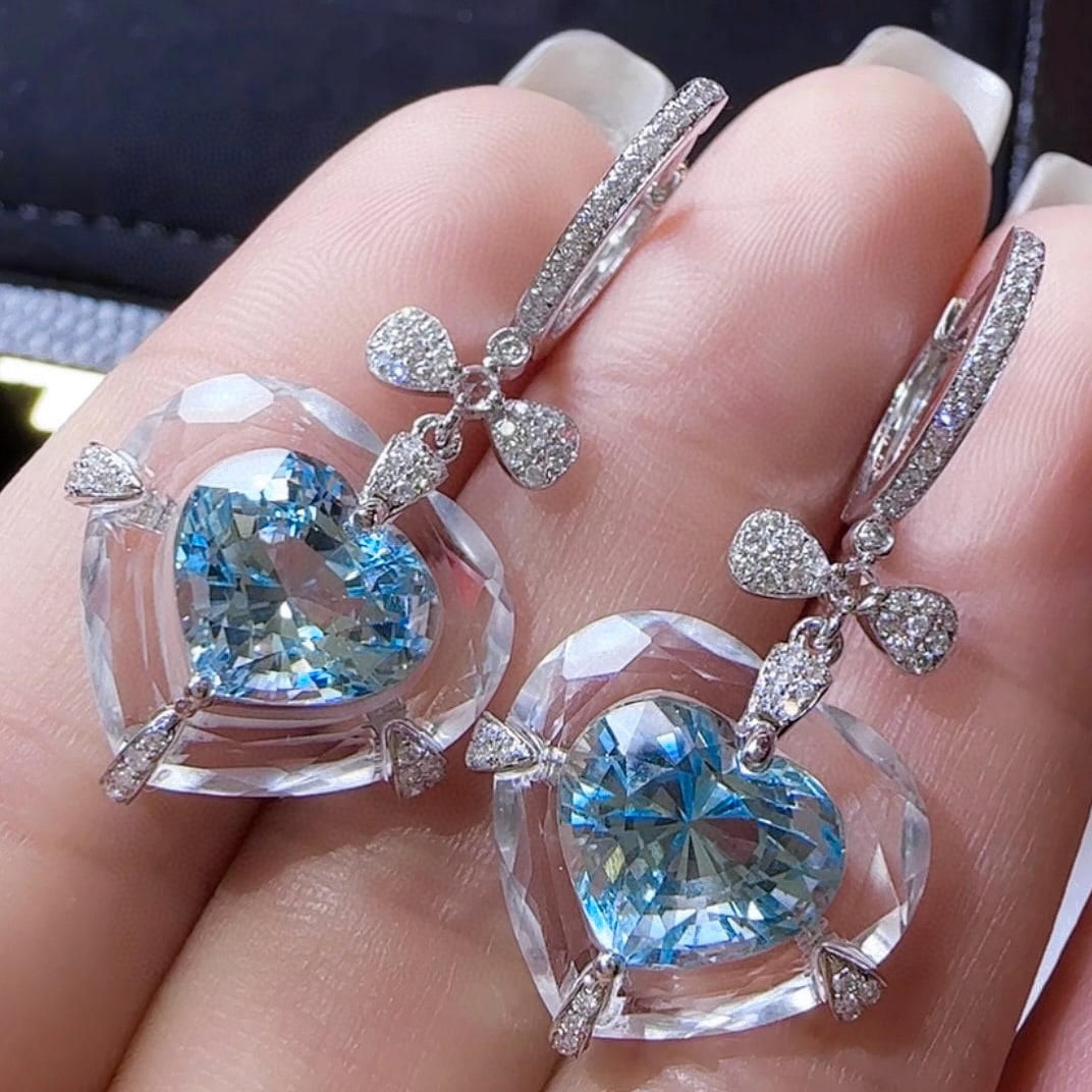 14k Gold 6.76 Ctw Natural Aquamarine & Diamond Earrings: Ref:231070396 // gold content:14k gold // main gemstone:aquamarine // shape:heart // carat weight:6. 33ct // color:santa maria color // treatment:natural // // adjacent gemstone 2 : diamond //