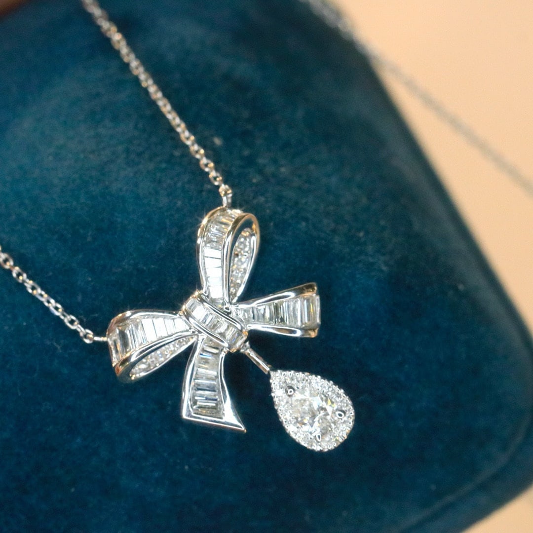 14k Gold 0.75 Ct Natural H Diamond Necklace: Ref:231070420 // gold content:14k gold // main gemstone:diamond // shape:multiple // carat weight:0. 75ct // clarity grade:vs-si // color:h // treatment:natural // High Estimate: 4300 Condition: New