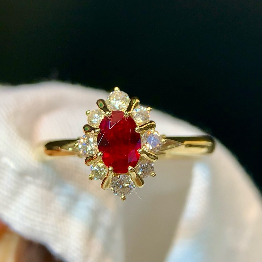 14k Gold 0.83 Ctw Vivid Red Natural Ruby & Diamond Ring: Ref:231070423 // gold content:14k gold // ring size:7. 25us // // main gemstone:ruby // shape:oval // carat weight:0. 56ct // color:vivid red // treatment:natural // // adjacent gemstone 2 : diamond
