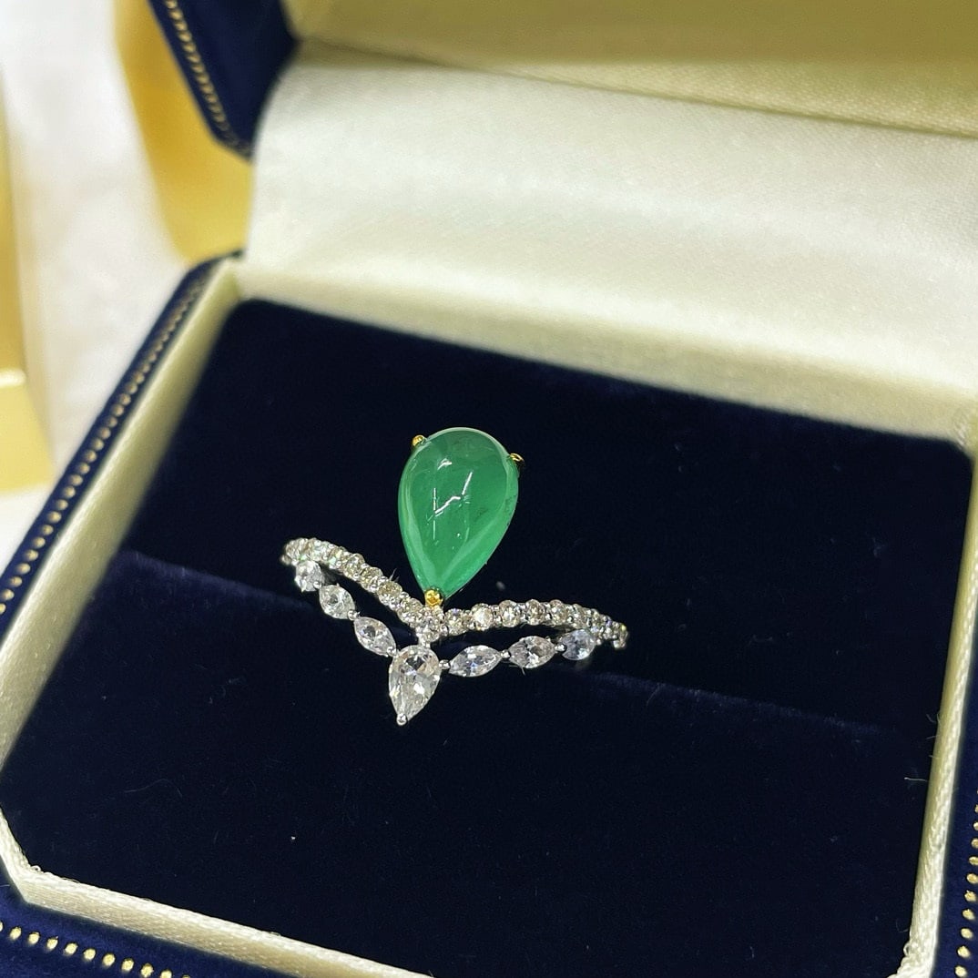 14k Gold 2.04 Ctw Natural Emerald & Diamond Ring: Ref:231070446 // gold content:14k gold // ring size:7. 25us // // main gemstone:emerald // shape:pear // carat weight:1. 85ct // color:green // treatment:natural // // adjacent gemstone 2 : diamond //
