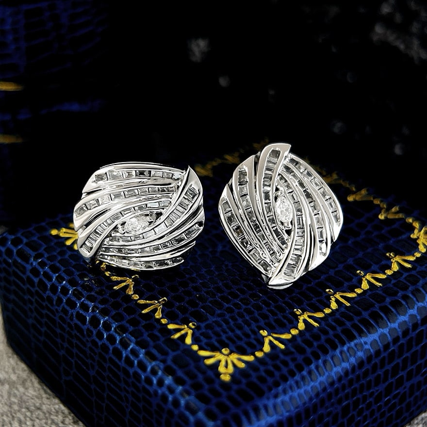 14k Gold 0.9 Ct Natural H Diamond Earrings: Ref:231070429 // gold content:14k gold // main gemstone:diamond // shape:multiple // carat weight:0. 9ct // clarity grade:vs-si // color:h // treatment:natural // Condition: New Low Estimate: 3500.00
