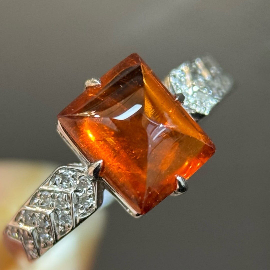 14k Gold 3.68 Ctw Natural Spessartine & Diamond Ring: Ref:231071079 // gold content:14k gold // ring size:7. 25us // // main gemstone:spessartine // shape:sugar-loaf // carat weight:3. 50ct // color:orange // treatment:natural // // adjacent gemstone 2