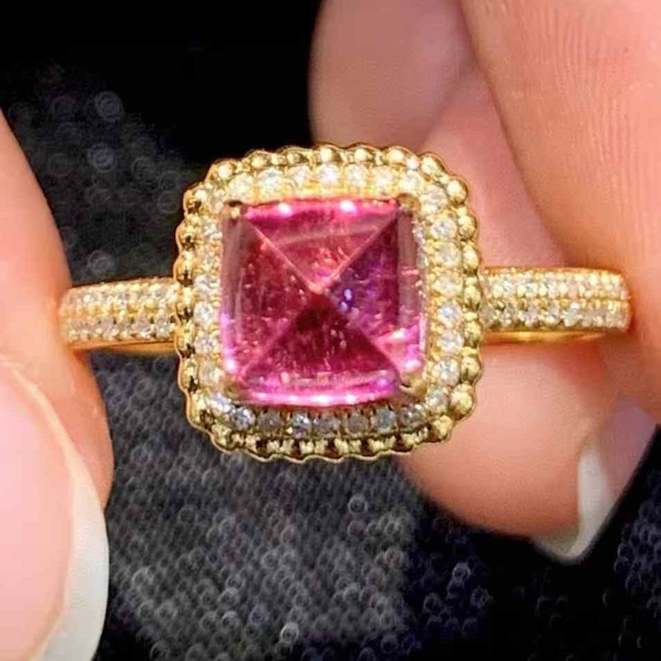 14k Gold 2.15 Ct Natural Tourmaline & Diamond Ring: Ref:231071118 // gold content:14k gold // ring size:7. 25us // // main gemstone:tourmaline // shape:sugar-loaf // carat weight:2. 15ct // color:pink // treatment:natural // // adjacent gemstone 2 : di
