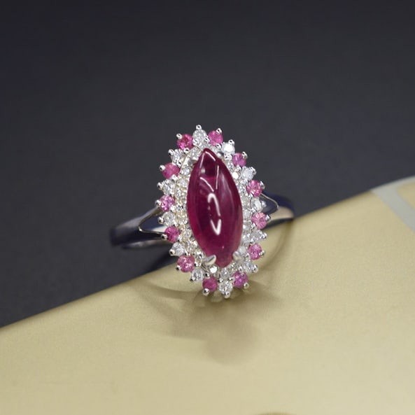 14k Gold 2.12 Ctw Natural Ruby & Diamond Ring: Ref:231071122 // gold content:14k gold // ring size:7. 25us // // main gemstone:ruby // shape:marquise // carat weight:1. 81ct // color:red // treatment:natural // // adjacent gemstone 2 : diamond //