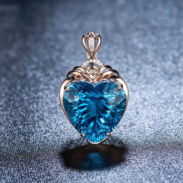 14k Gold 20.68 Ct Natural Topaz & Diamond Pendant( Without Chain ): Ref:231071215 // gold content:14k gold // main gemstone:topaz // shape:heart // carat weight:20. 68ct // color:blue // treatment:natural // // adjacent gemstone 2 : diamond // shape:round // clarity g