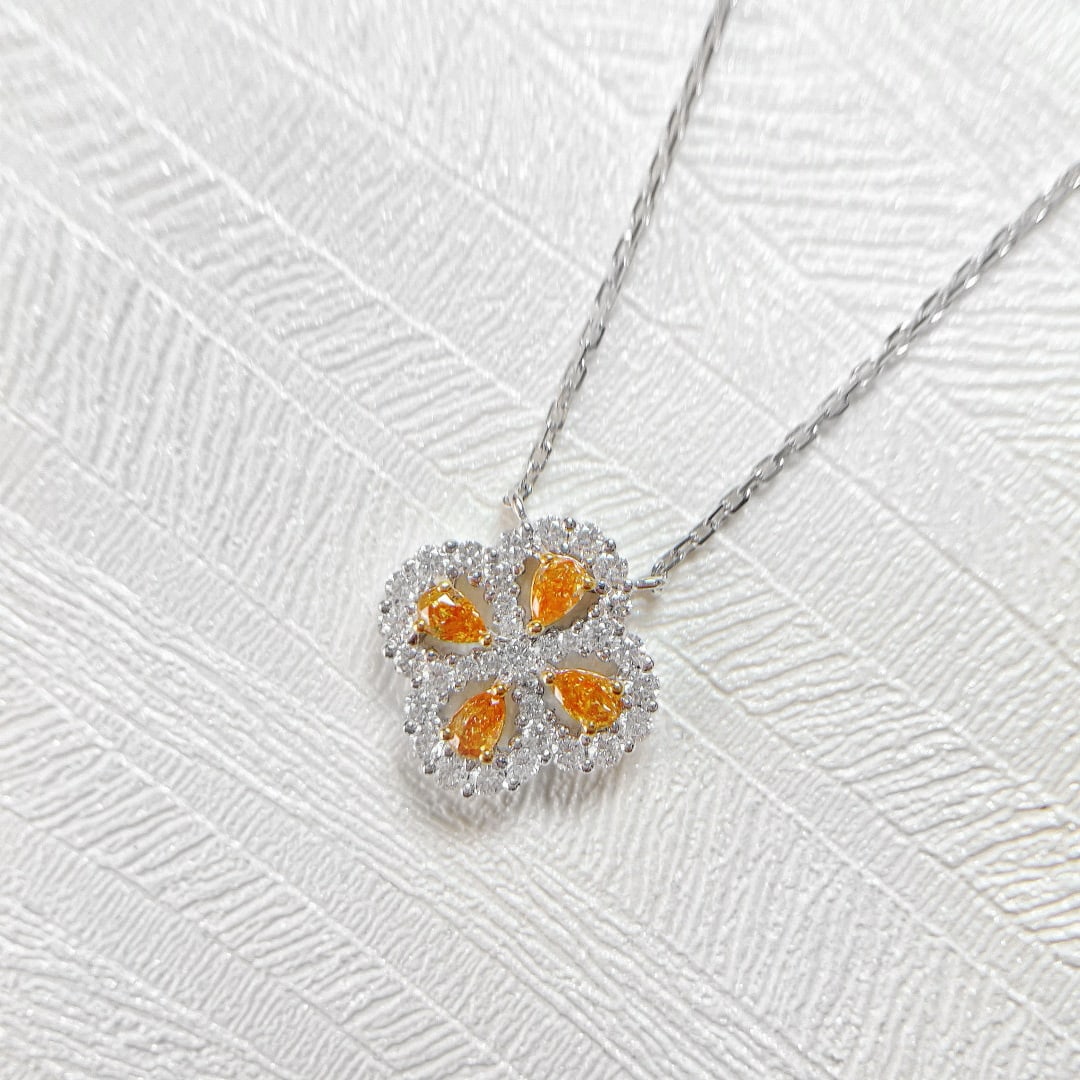 14k Gold 0.68 Ctw Natural Orange Diamond & Diamond Necklace: Ref:231072028 // gold content:14k gold // main gemstone:orange diamond // shape:pear // carat weight:0. 28ct // color:orange // treatment:natural // // adjacent gemstone 2 : diamond // shape:round // 