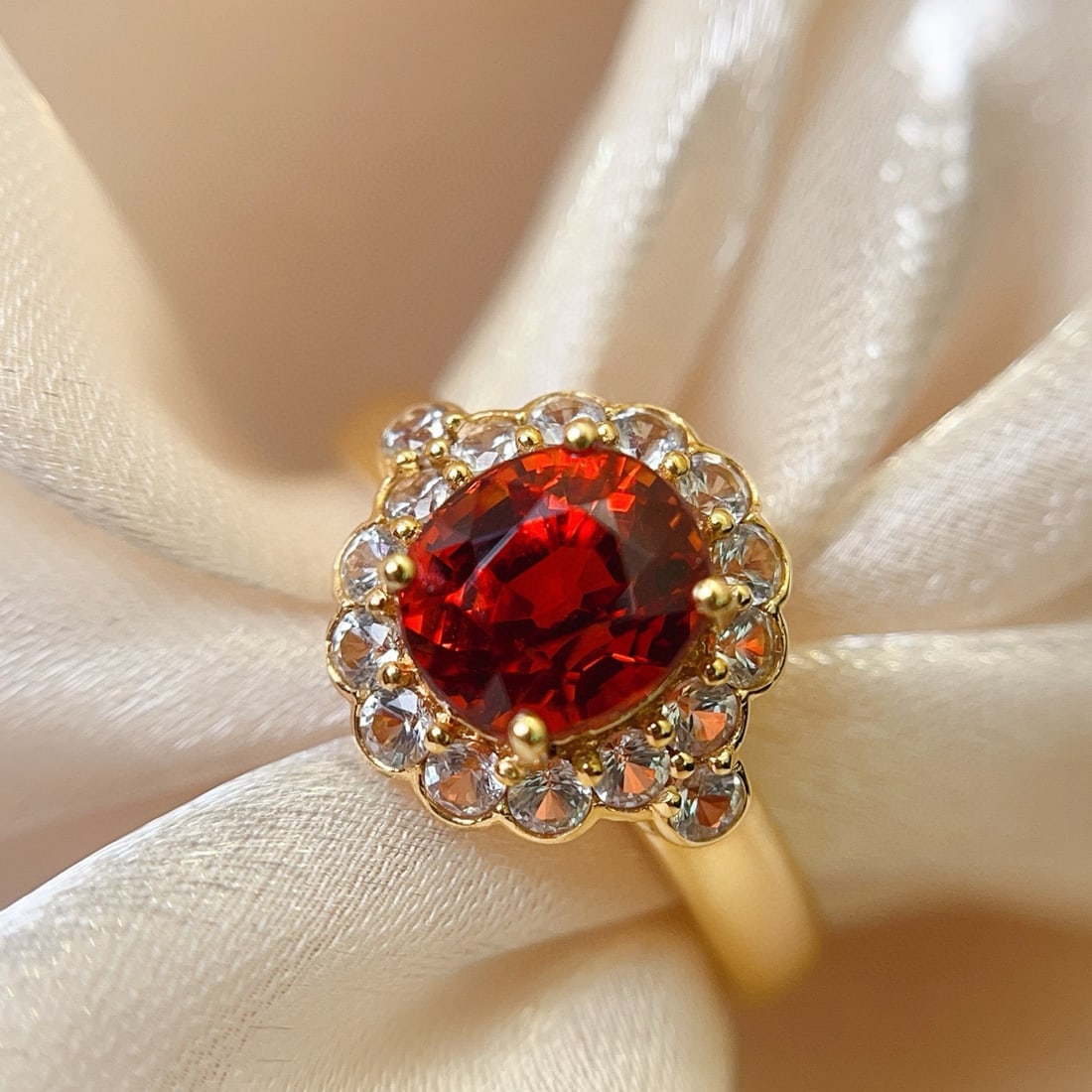 14k Gold 2.50 Ct Natural Spessartine & Sapphire Ring: Ref:231072039 // gold content:14k gold // ring size:7. 25us // // main gemstone:spessartine // shape:oval // carat weight:2. 50ct // color:orange // treatment:natural // // adjacent gemstone 2 :