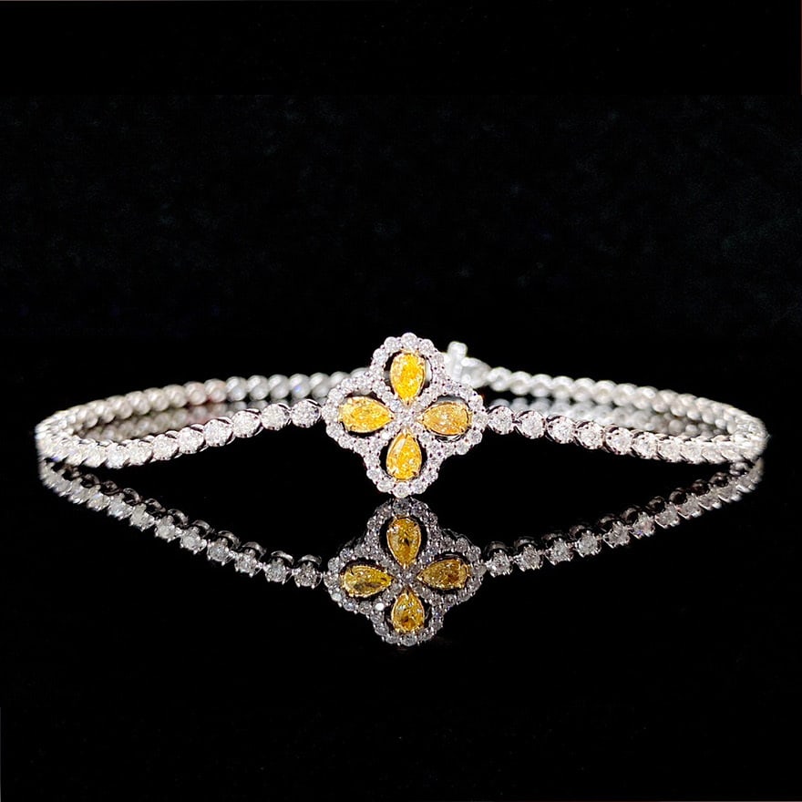 14k Gold 1.78 Ctw Natural Yellow Diamond & Diamond Bracelet: Ref:231072040 // gold content:14k gold // main gemstone:yellow diamond // shape:pear // carat weight:0. 38ct // color:yellow // treatment:natural // // adjacent gemstone 2 : diamond // shape:round //
