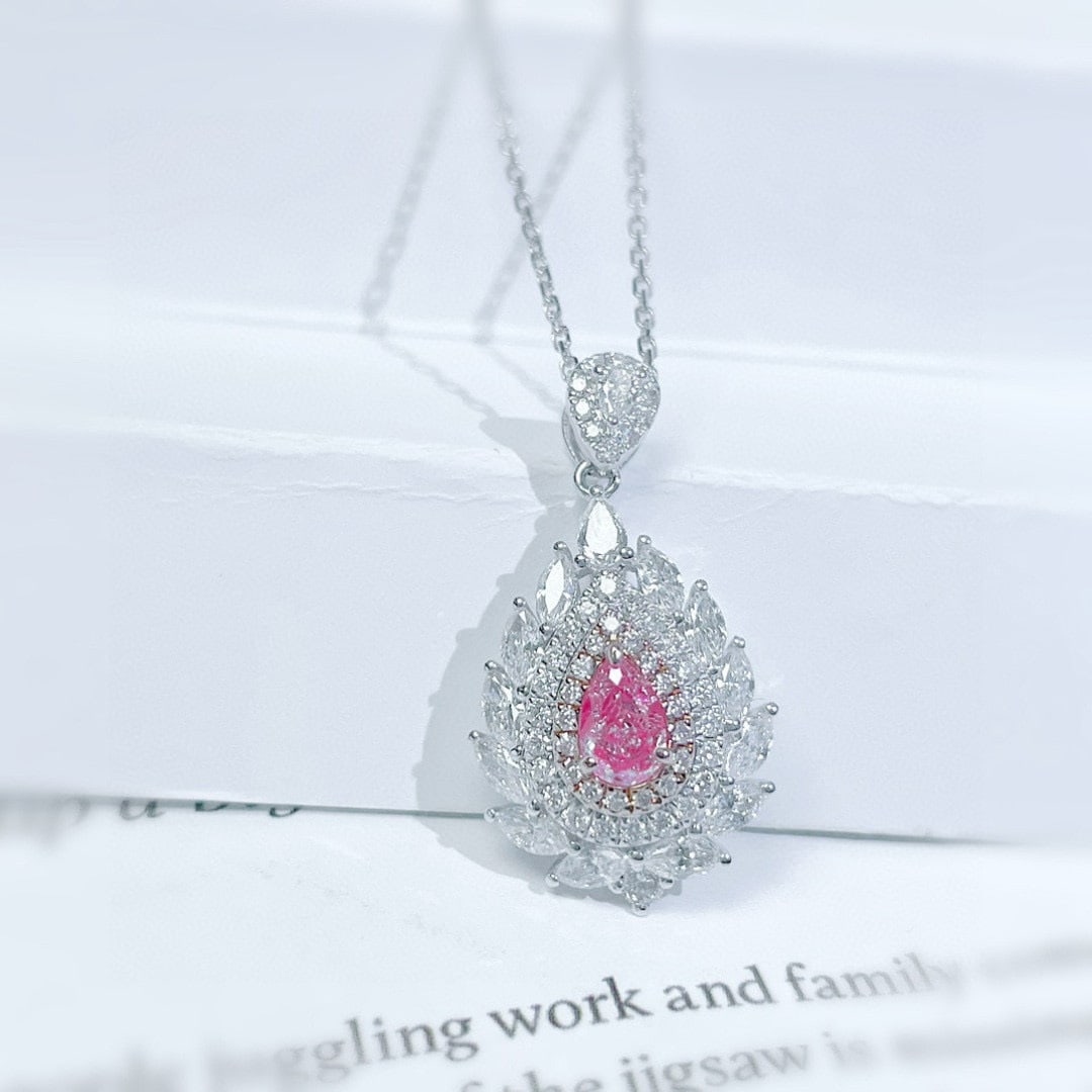 14k Gold 1.33 Ctw Natural Pink Diamond & Diamond Necklace: Ref:231072056 // gold content:14k gold // main gemstone:pink diamond // shape:pear // carat weight:0. 36ct // color:pink // treatment:natural // // adjacent gemstone 2 : diamond // shape:multiple //