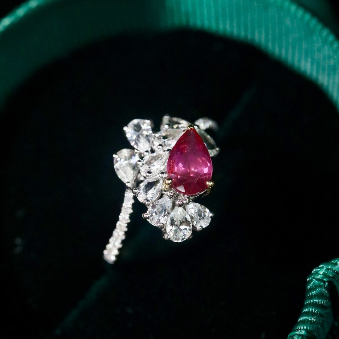 14k Gold 0.85 Ctw Natural Ruby & Diamond Ring: Ref:231072089 // gold content:14k gold // ring size:7. 25us // // main gemstone:ruby // shape:pear // carat weight:0. 77ct // color:red // treatment:natural // // adjacent gemstone 2 : diamond //